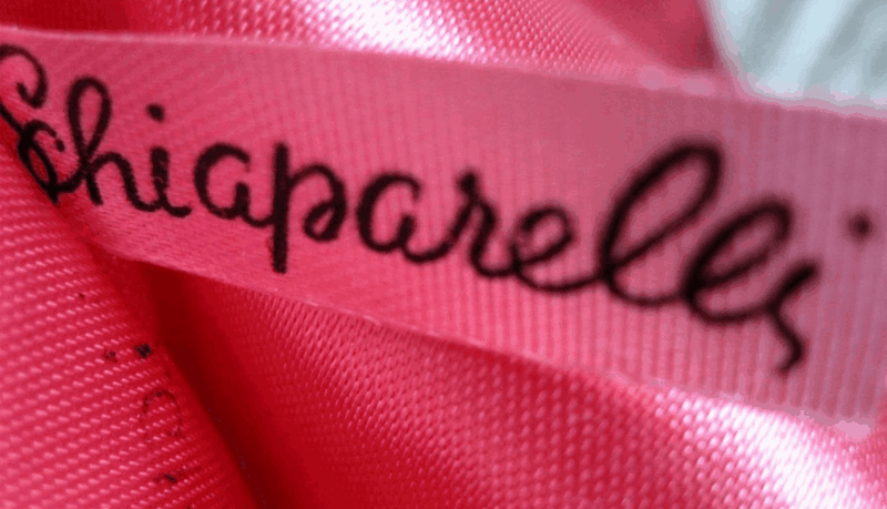 Schiaparelli brand name tag