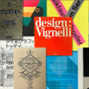 Overhead view of design and typography books with colorful red, yellow, green and blue covers.
