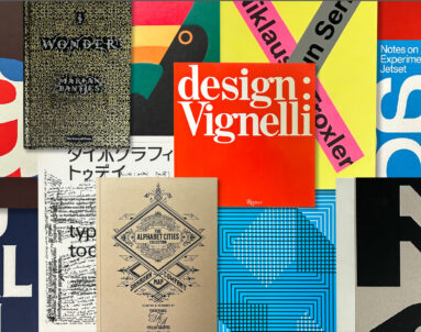 Overhead view of design and typography books with colorful red, yellow, green and blue covers.