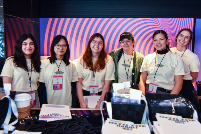 Six volunteers posing for the camera at DesignThinkers 2024 in Toronto.