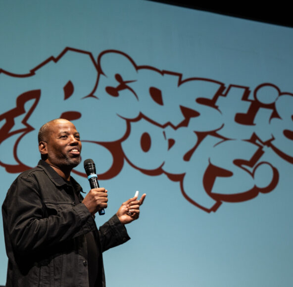 Cey Adams on stage presenting